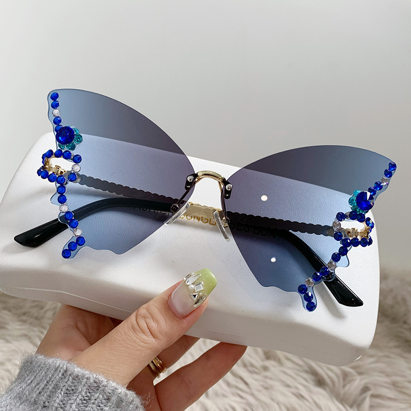 Gafas de sol sin montura con forma de mariposa individualmente