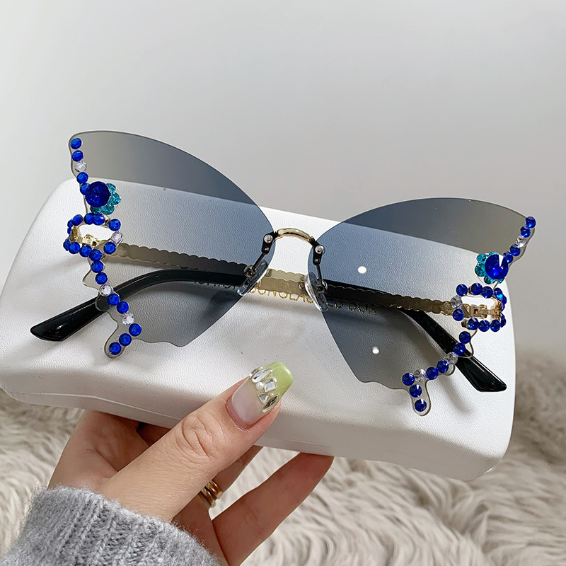 Gafas de sol sin montura con forma de mariposa individualmente