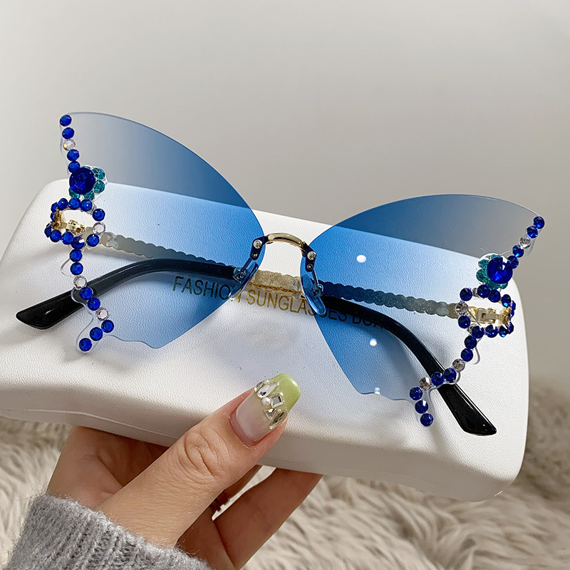 Gafas de sol sin montura con forma de mariposa individualmente