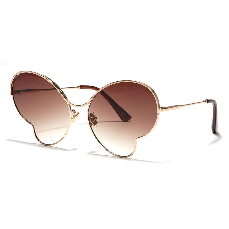 Gafas de sol con montura de mariposa de metal degradado para mujer