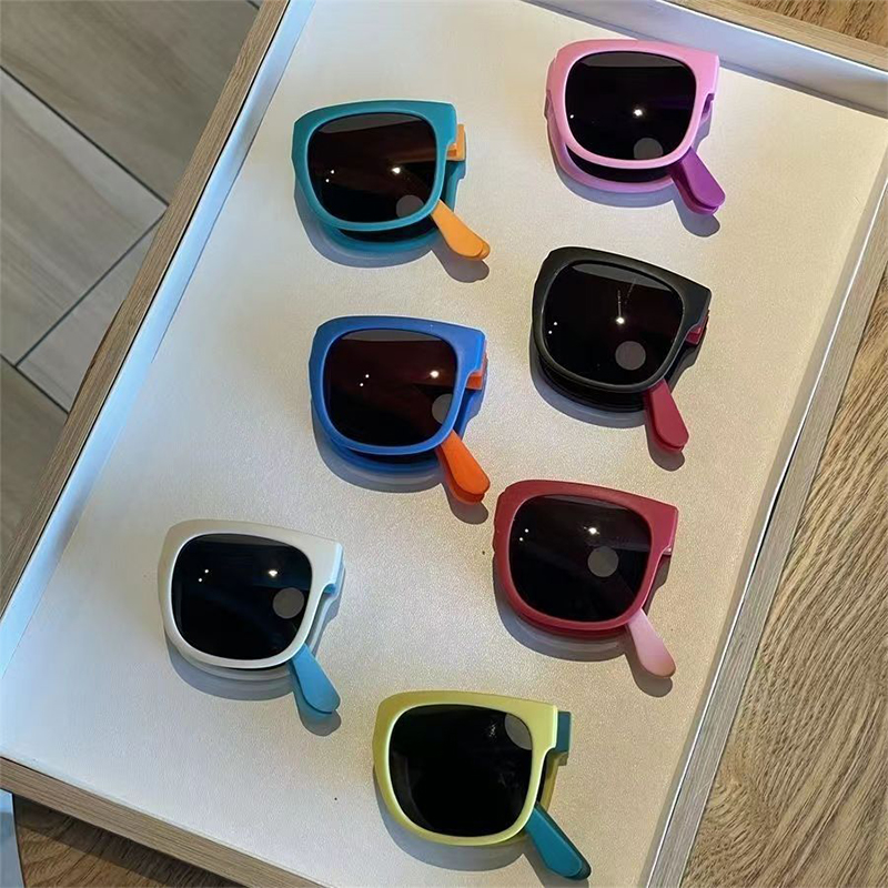 Gafas de sol plegables con protección UV de varios colores para niños